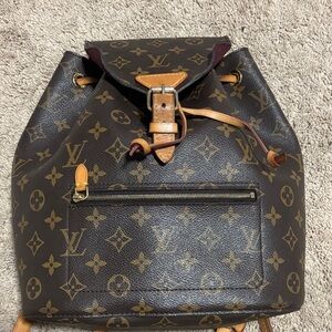 Louis Vuitton Monogram Canvas Drawstring Backpack in Brown and Tan